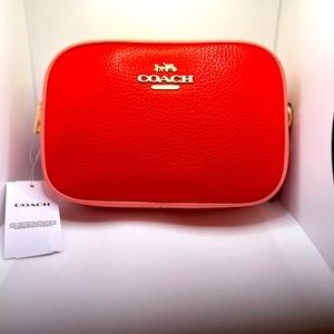 NWT red and orange Coach color block crossbody purse.